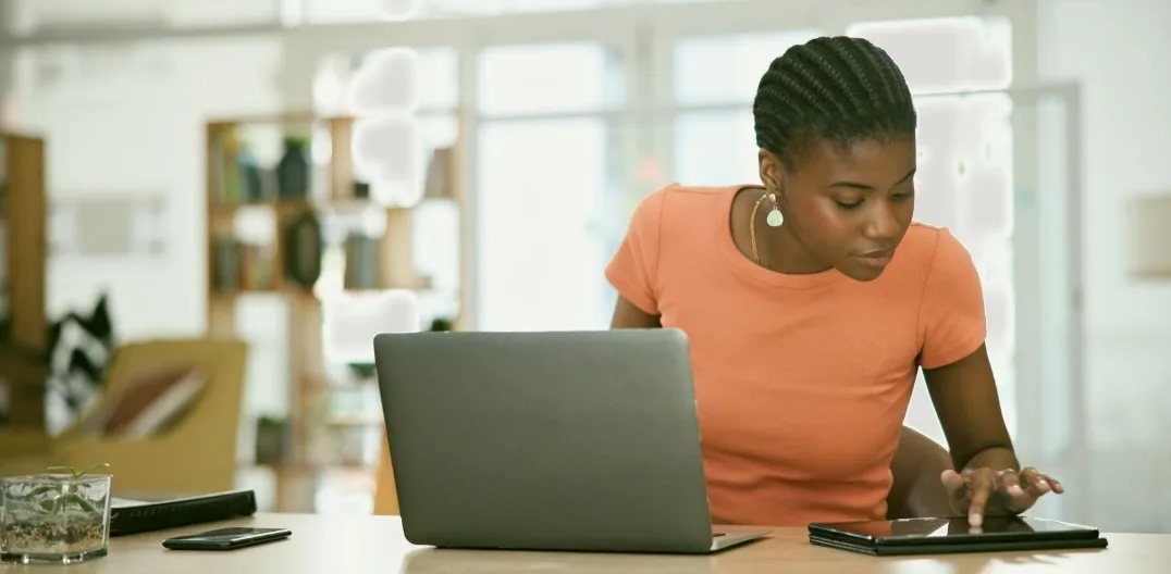 An employee learning a new digital tool to adapt to changes in the workplace.
