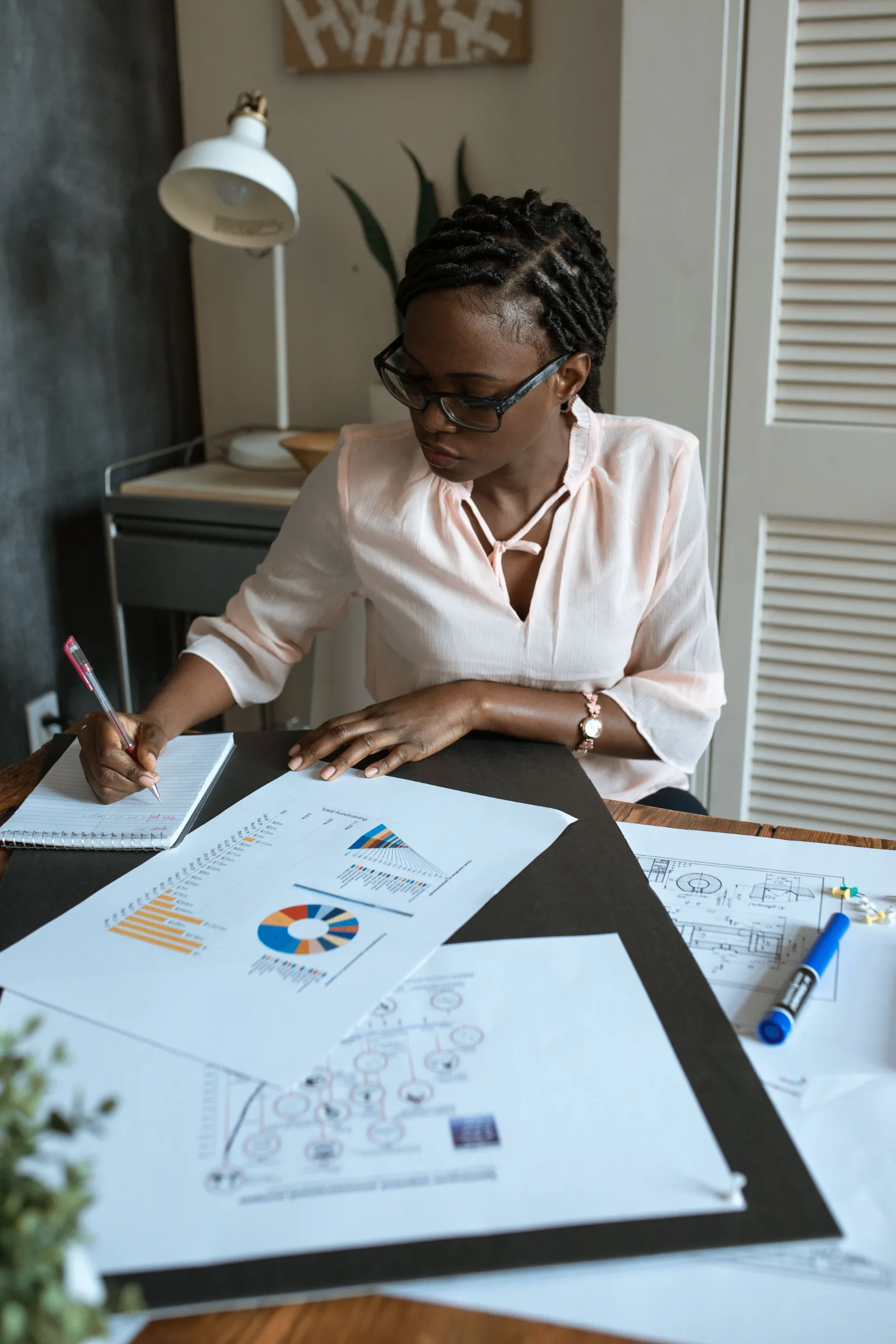 An entrepreneur ensuring to make things better for her business.